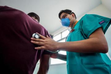 Doctor consulting a patient with tuberculosis 